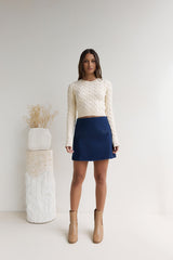 Der exklusive Zopfstrickpullover Cremeweiß
